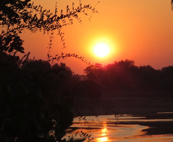 Sunset over Zimbabwe to 63 countries (Day 12 of 12 Christmas stories)